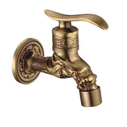 Bronze faucet with intricate design on a white background