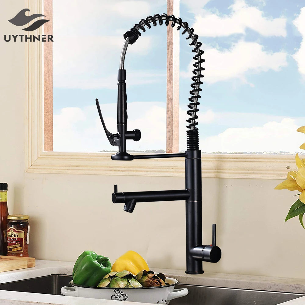 Black kitchen faucet with a spring design in a kitchen setting.