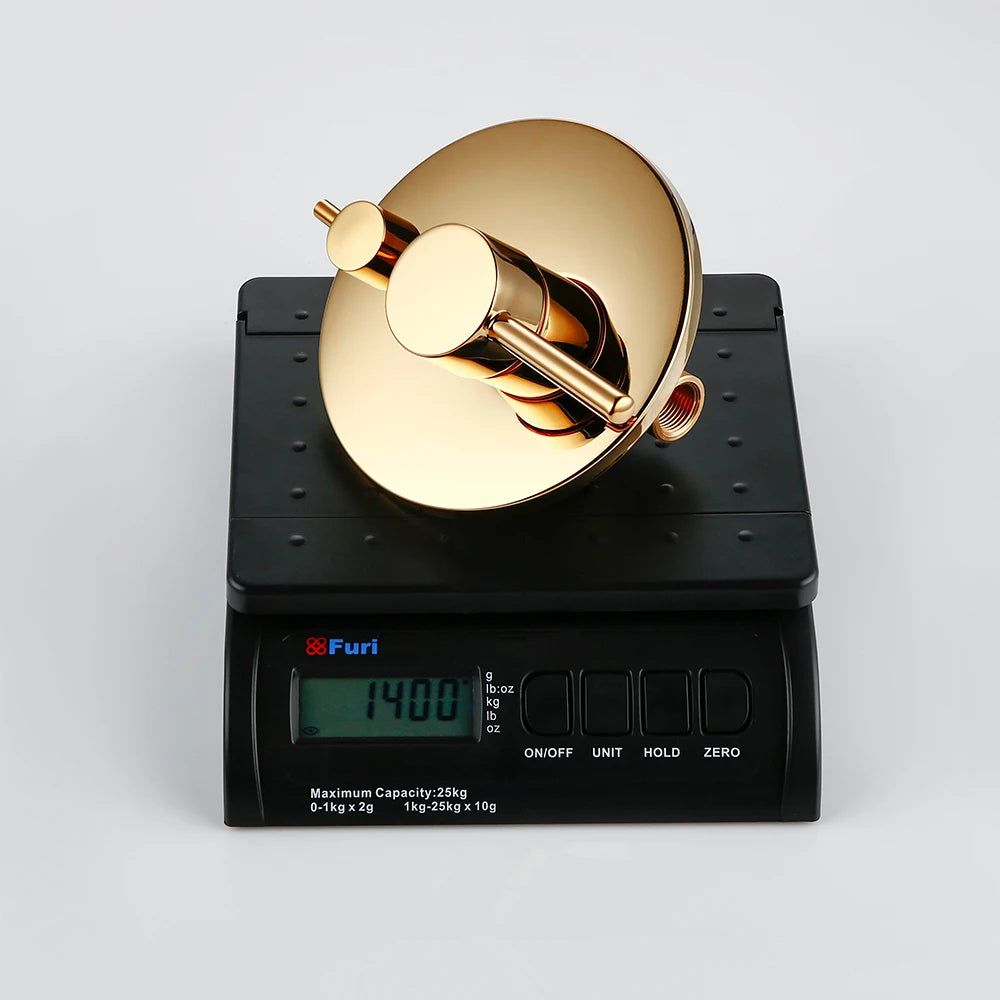 Gold faucet on a digital scale with 'Furi' branding on a white background