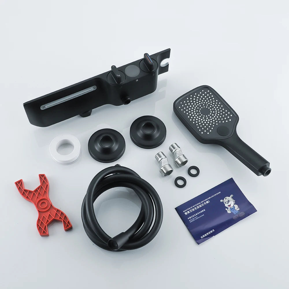 Collection of shower head and related parts on a white background